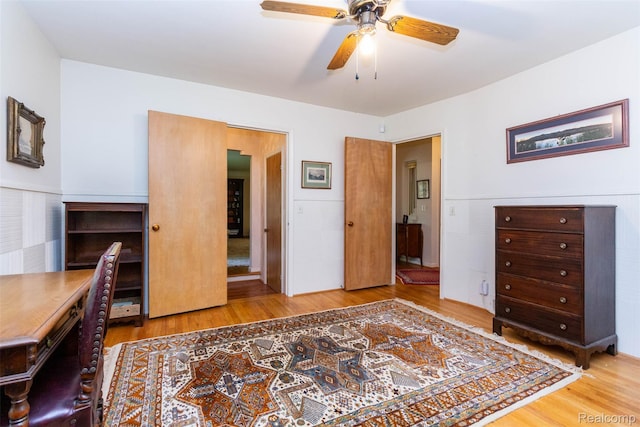20550 Fairway Ln, Grosse Pointe Woods, MI 48236 - bedroom with wood finished floors, an office area, and ceiling fan