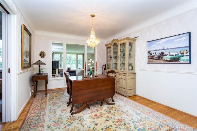 20550 Fairway Ln, Grosse Pointe Woods, MI 48236 - dining room with light wood-style flooring and a chandelier
