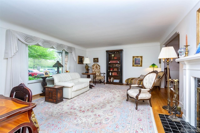 20550 Fairway Ln, Grosse Pointe Woods, MI 48236 - living area featuring a tile fireplace and wood finished floors