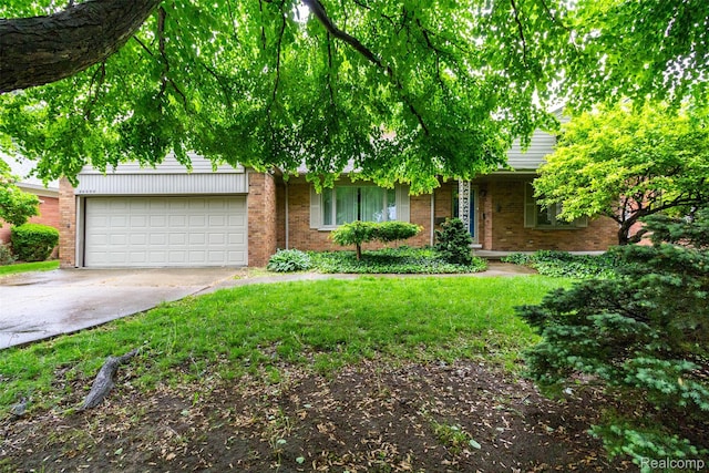 20550 Fairway Ln, Grosse Pointe Woods, MI 48236 - view of property hidden behind natural elements with brick siding, driveway, an attached garage, and a front yard