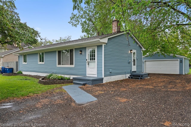6262 Garden Ct, Warren, MI 48091 - single story home with an outbuilding, a garage, and a chimney