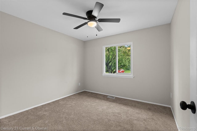 6262 Garden Ct, Warren, MI 48091 - carpeted empty room featuring baseboards and a ceiling fan