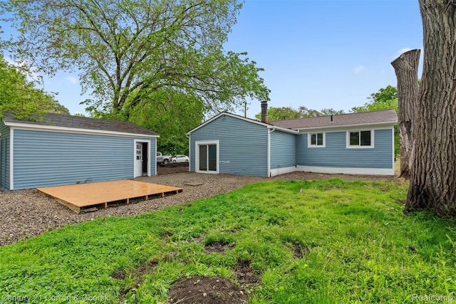 6262 Garden Ct, Warren, MI 48091 - back of property featuring a wooden deck and a yard