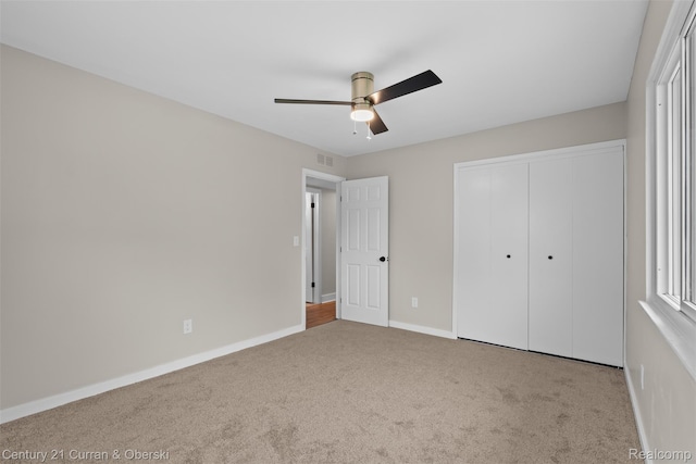 6262 Garden Ct, Warren, MI 48091 - unfurnished bedroom with carpet flooring, baseboards, a closet, and a ceiling fan