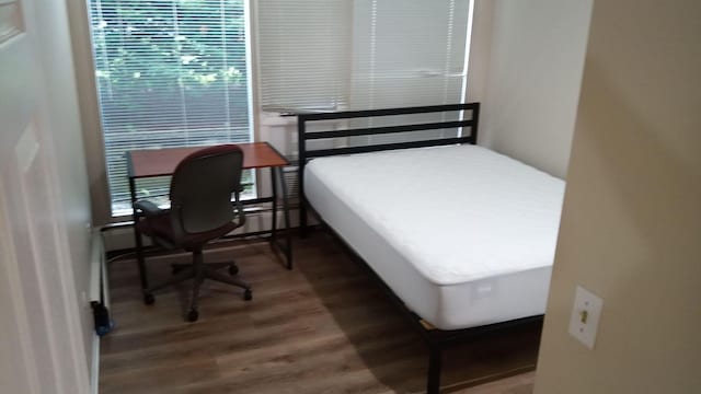 1531 Packard St Unit 2, Ann Arbor, MI 48104 - bedroom with wood finished floors and multiple windows