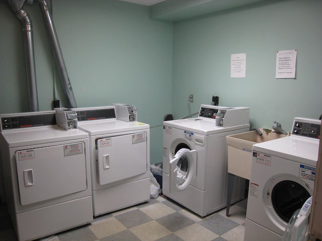 1531 Packard St Unit 2, Ann Arbor, MI 48104 - communal laundry room featuring washing machine and dryer and light flooring