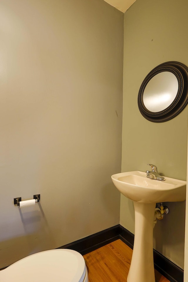 93 Illinois St, Battle Creek, MI 49014 - half bath with wood finished floors and toilet