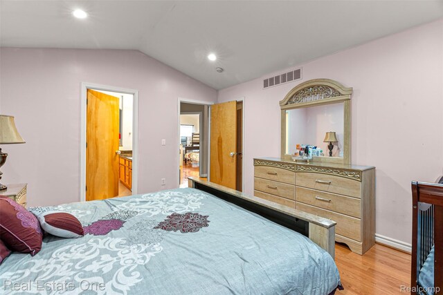5410 Argyle St, Dearborn, MI 48126 - bedroom with light wood-style floors, lofted ceiling, recessed lighting, and baseboards