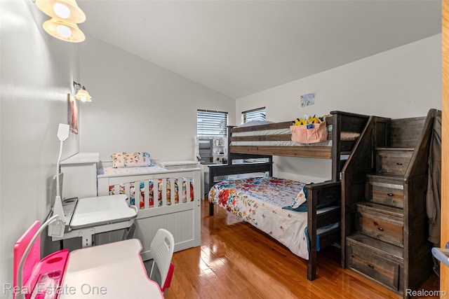 5410 Argyle St, Dearborn, MI 48126 - bedroom featuring wood finished floors and vaulted ceiling