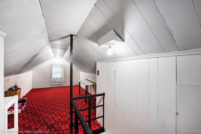 35825 Oakwood Ln, Westland, MI 48186 - bonus room featuring lofted ceiling, carpet, and wooden walls