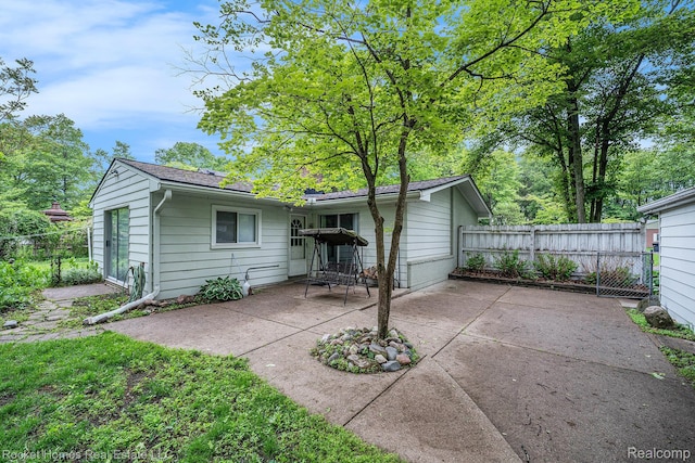 35825 Oakwood Ln, Westland, MI 48186 - rear view of property with a patio