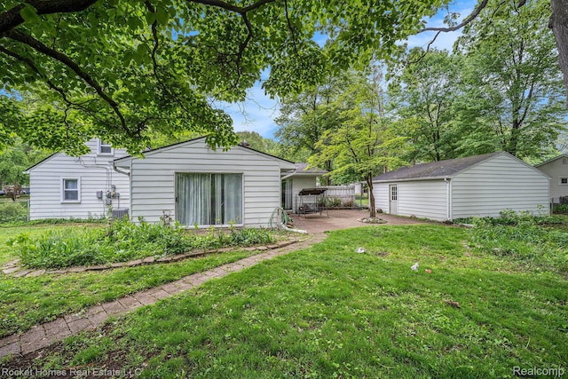 35825 Oakwood Ln, Westland, MI 48186 - view of yard with a patio and an outbuilding