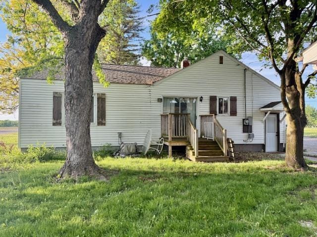 5547 Davison Rd, Davison, MI 48446 - back of property with a chimney and a lawn