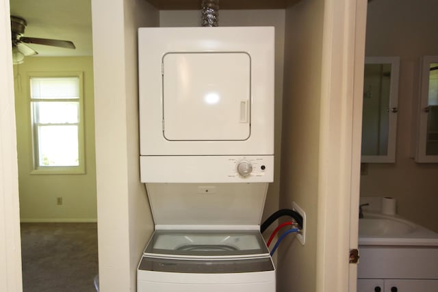 1772 E T Ave, Portage, MI 49002 - laundry area with estacked washer and dryer and a ceiling fan