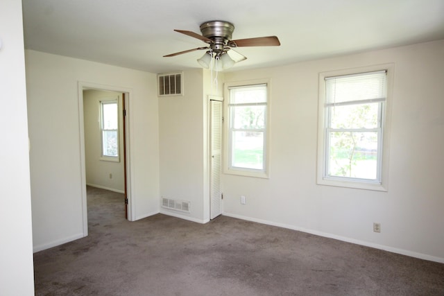 1772 E T Ave, Portage, MI 49002 - carpeted spare room featuring ceiling fan and baseboards