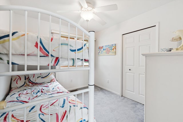 14814 Lark Dr, Camden, MI 49232 - carpeted bedroom with baseboards and ceiling fan