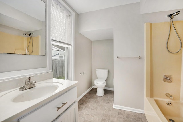 1535 Colorado Ave SE, Grand Rapids, MI 49507 - bathroom with vanity, bathing tub / shower combination, baseboards, and toilet
