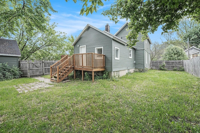 1535 Colorado Ave SE, Grand Rapids, MI 49507 - rear view of house with a deck, a chimney, and stairway
