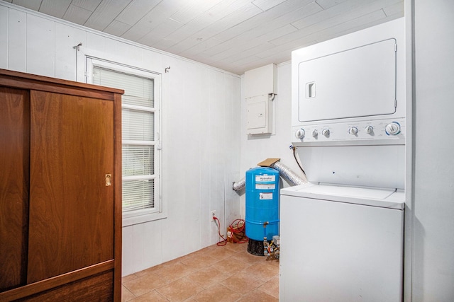 12948 Sandyside Dr, Gowen, MI 49326 - washroom with stacked washer / drying machine, wood walls, and wood ceiling