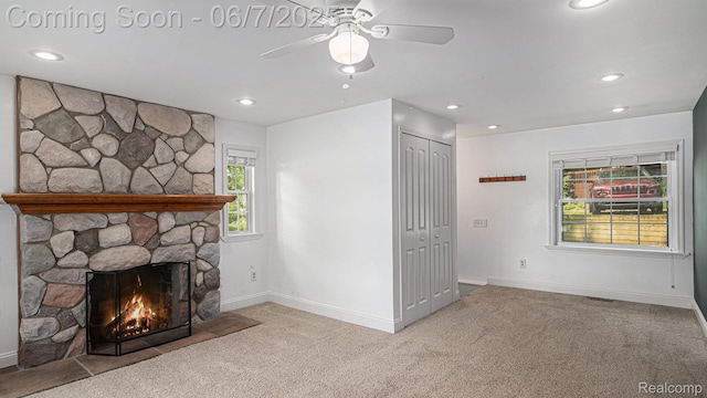 6288 Buckshore Dr, Whitmore Lake, MI 48189 - unfurnished living room featuring carpet, ceiling fan, a fireplace, baseboards, and recessed lighting