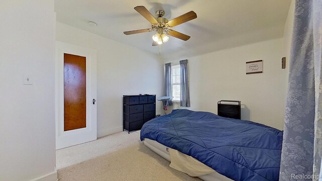 416 Marquette St, Flint, MI 48504 - bedroom featuring carpet, baseboards, and a ceiling fan