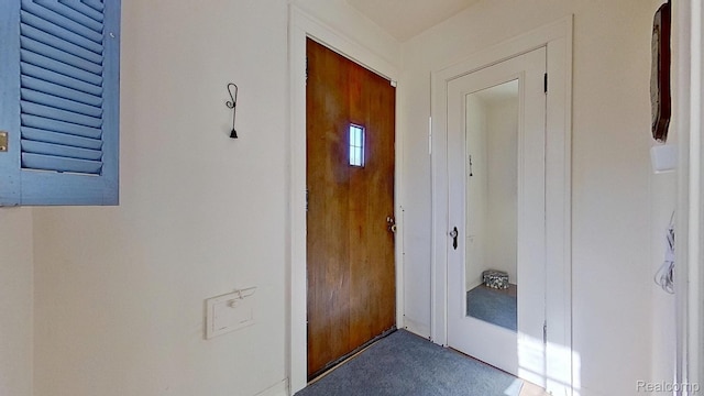416 Marquette St, Flint, MI 48504 - doorway to outside with carpet floors