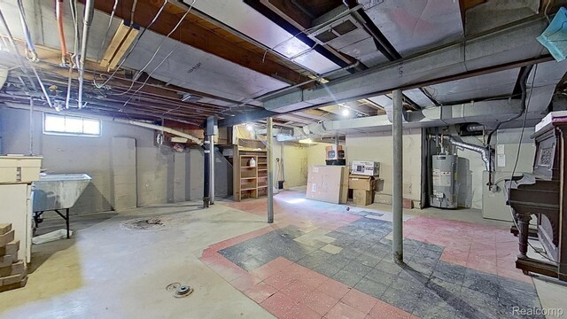 416 Marquette St, Flint, MI 48504 - below grade area with water heater