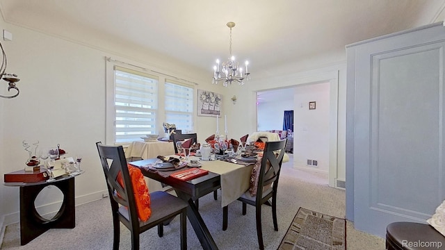 416 Marquette St, Flint, MI 48504 - carpeted dining area with a chandelier and baseboards