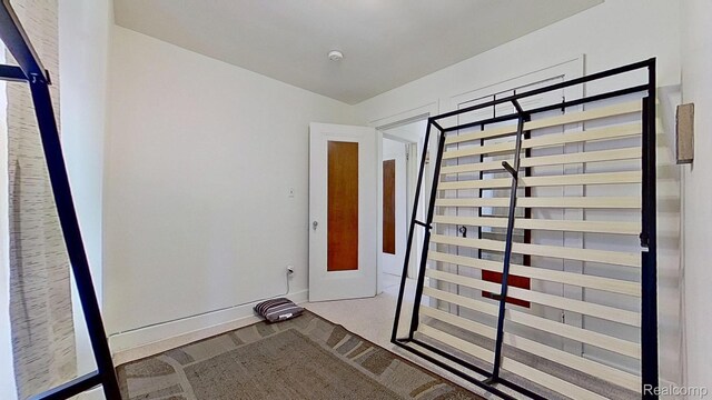416 Marquette St, Flint, MI 48504 - unfurnished room featuring baseboards and a smoke detector
