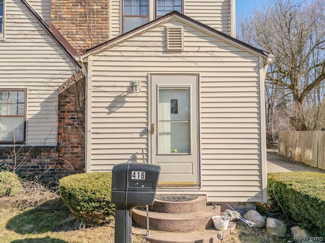 416 Marquette St, Flint, MI 48504 - entrance to property with a chimney