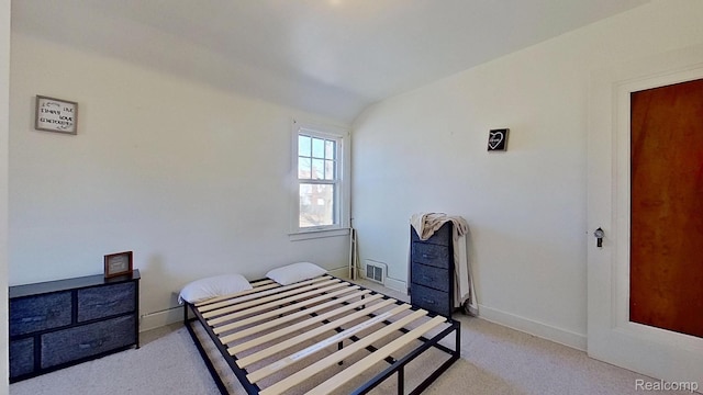 416 Marquette St, Flint, MI 48504 - bedroom with baseboards and lofted ceiling