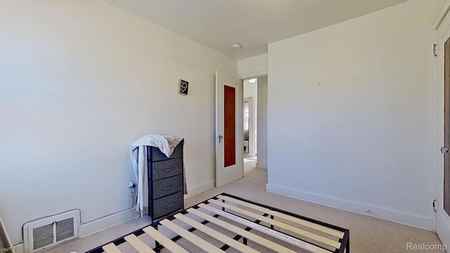416 Marquette St, Flint, MI 48504 - unfurnished bedroom featuring baseboards