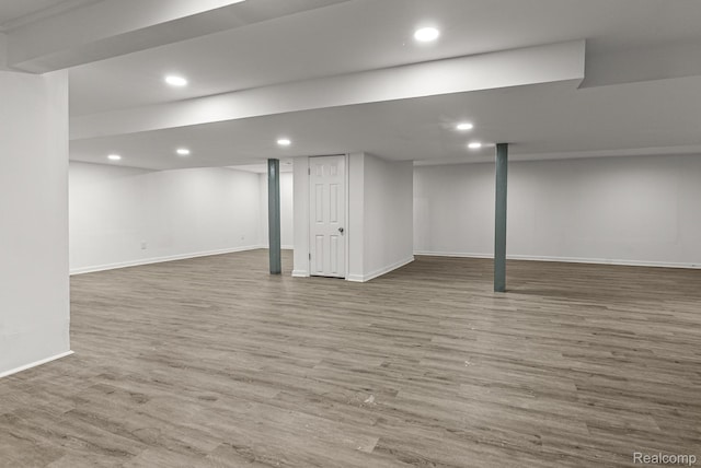 4766 Quarton Rd, Bloomfield, MI 48302 - finished basement featuring baseboards, wood finished floors, and recessed lighting