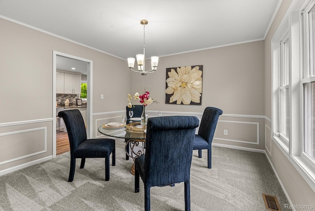 4766 Quarton Rd, Bloomfield, MI 48302 - dining room with crown molding, a chandelier, and carpet