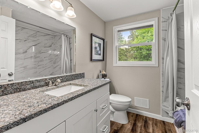 4766 Quarton Rd, Bloomfield, MI 48302 - bathroom with vanity, toilet, wood finished floors, baseboards, and a shower with shower curtain