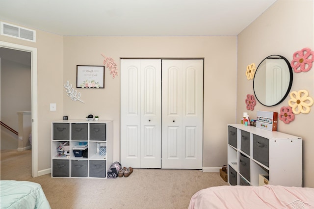 7302 Geraldine Cir, Swartz Creek, MI 48473 - carpeted bedroom featuring baseboards and a closet