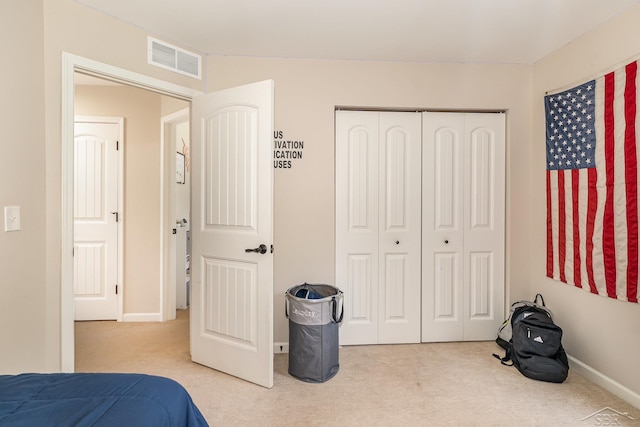 7302 Geraldine Cir, Swartz Creek, MI 48473 - bedroom featuring carpet floors, a closet, and baseboards