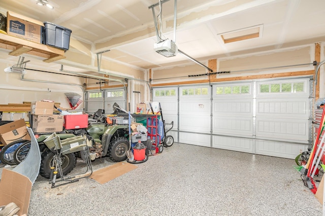 7302 Geraldine Cir, Swartz Creek, MI 48473 - garage featuring a garage door opener