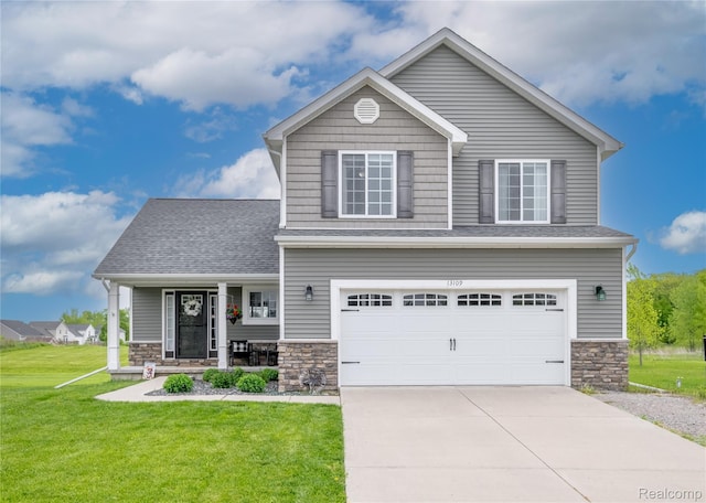 13109 River Rock Pass, Linden, MI 48451 - view of front facade featuring stone siding, a front lawn, an attached garage, driveway, and covered porch