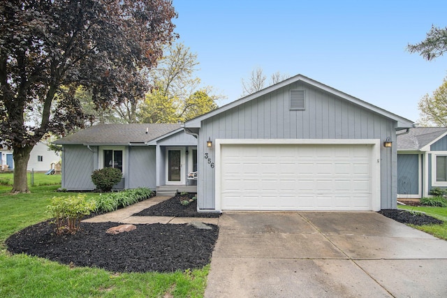 356 Woodlake Dr, Brighton, MI 48116 - single story home with a garage, driveway, and a front yard