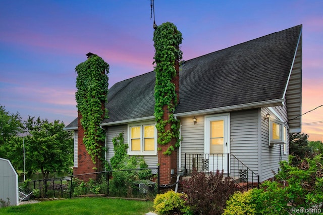 3266 Benstein Rd, Commerce Twp, MI 48382 - view of front of home featuring a chimney and a shingled roof