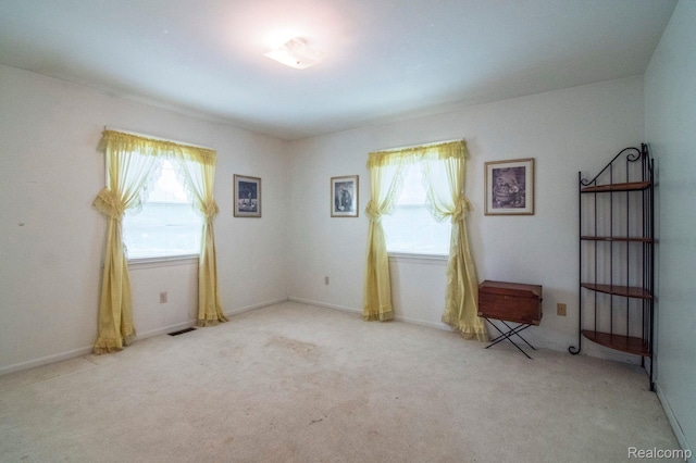 3266 Benstein Rd, Commerce Twp, MI 48382 - spare room featuring carpet