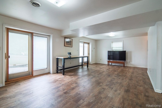 3266 Benstein Rd, Commerce Twp, MI 48382 - unfurnished living room with wood finished floors and baseboards