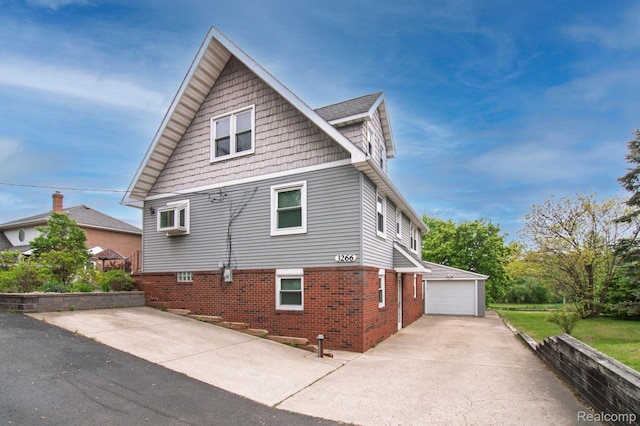 3266 Benstein Rd, Commerce Twp, MI 48382 - view of side of home with a garage and brick siding