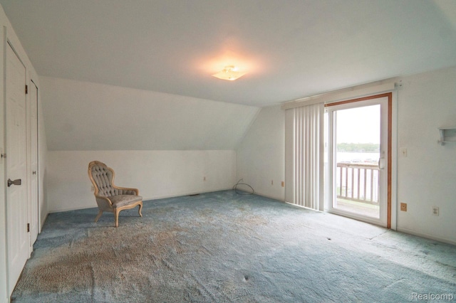 3266 Benstein Rd, Commerce Twp, MI 48382 - additional living space featuring carpet flooring and lofted ceiling