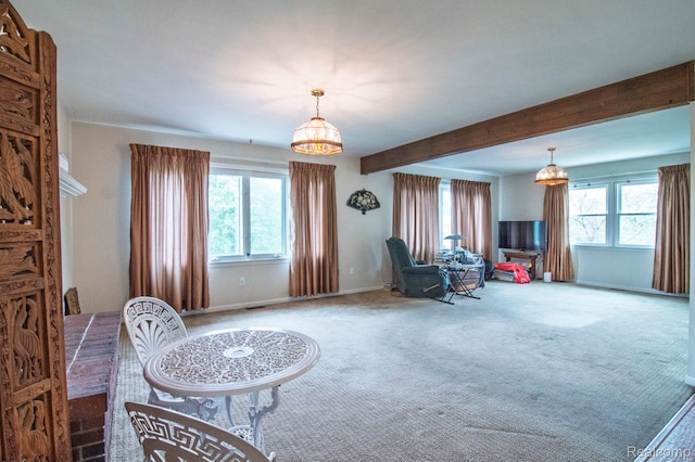 3266 Benstein Rd, Commerce Twp, MI 48382 - living area featuring plenty of natural light, a chandelier, carpet floors, beamed ceiling, and baseboards
