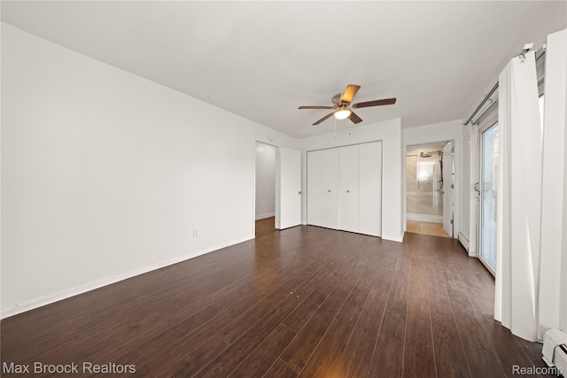 28290 Inkster Rd, Southfield, MI 48034 - unfurnished bedroom featuring dark wood-style flooring, a closet, baseboards, a baseboard radiator, and a ceiling fan