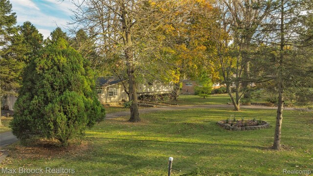 28290 Inkster Rd, Southfield, MI 48034 - view of home's community with a lawn