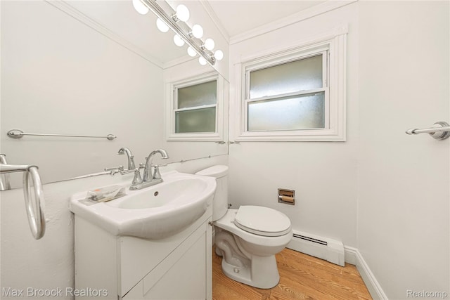 28290 Inkster Rd, Southfield, MI 48034 - bathroom with a baseboard radiator, vanity, ornamental molding, toilet, and wood finished floors