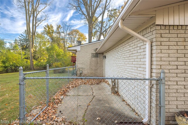 28290 Inkster Rd, Southfield, MI 48034 - view of side of home featuring brick siding